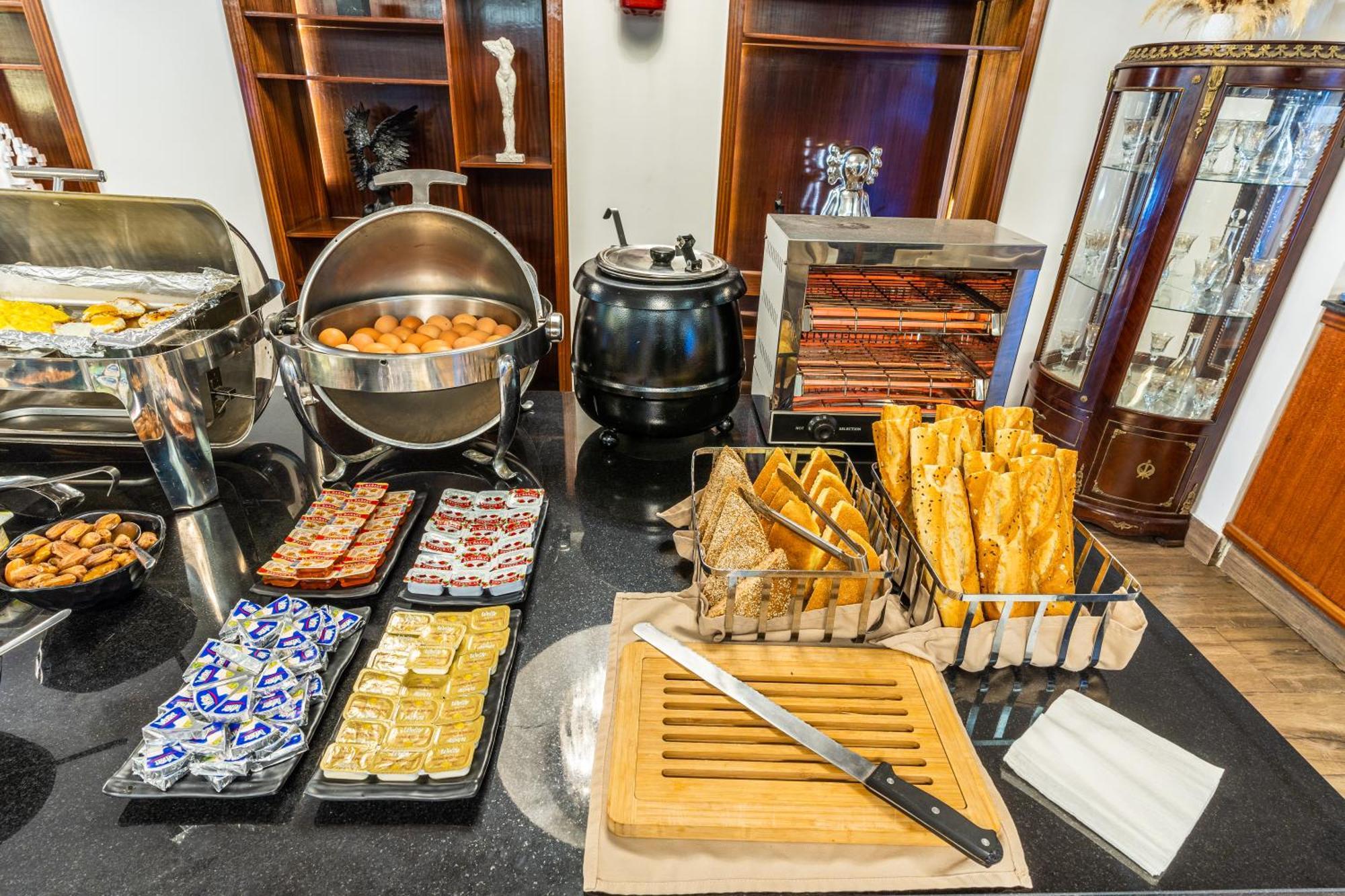 One Hotel カサブランカ エクステリア 写真 A chafing dish (right)